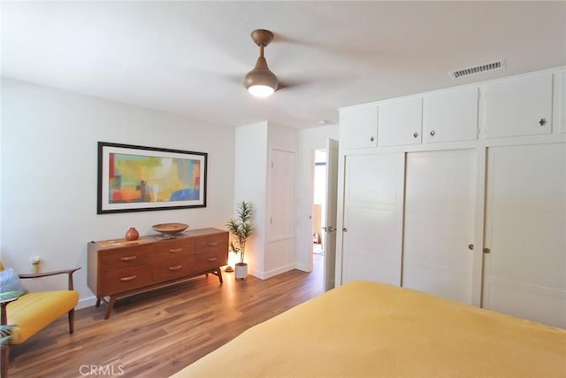 170 Avenida Majorca Unit A, Laguna Woods, CA 92637 - bedroom featuring wood finished floors, a closet, and a ceiling fan