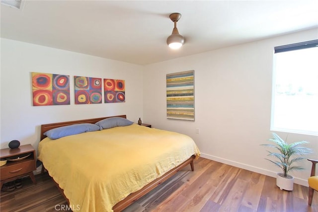 170 Avenida Majorca Unit A, Laguna Woods, CA 92637 - bedroom with multiple windows and wood finished floors
