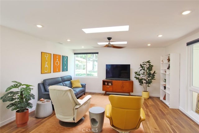 170 Avenida Majorca Unit A, Laguna Woods, CA 92637 - living area featuring a skylight, light wood-style floors, recessed lighting, and ceiling fan