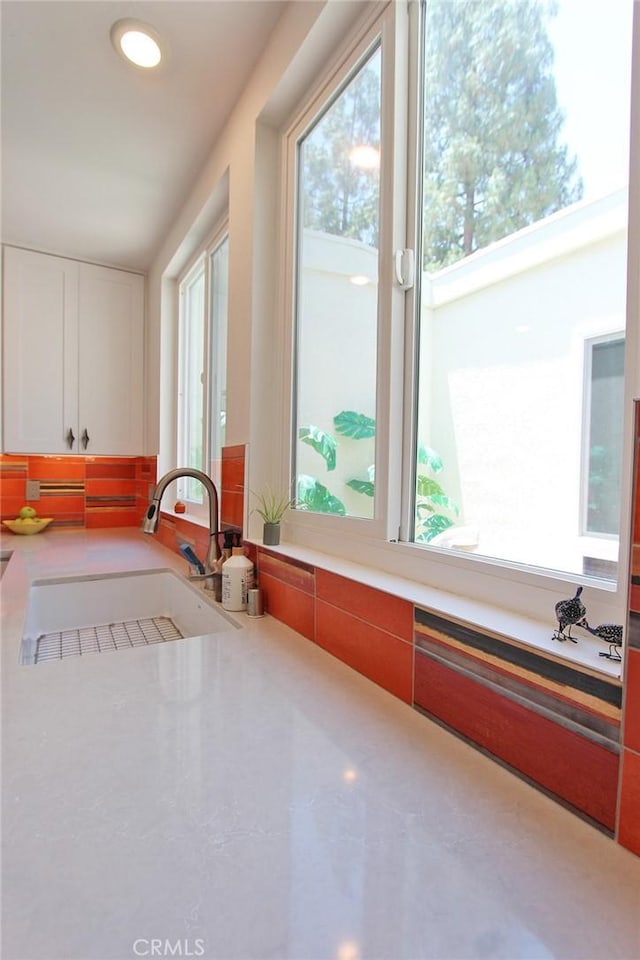 170 Avenida Majorca Unit A, Laguna Woods, CA 92637 - kitchen with white cabinetry and light countertops