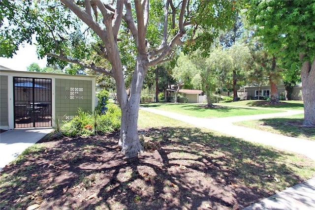170 Avenida Majorca Unit A, Laguna Woods, CA 92637 - view of grassy yard with a gate