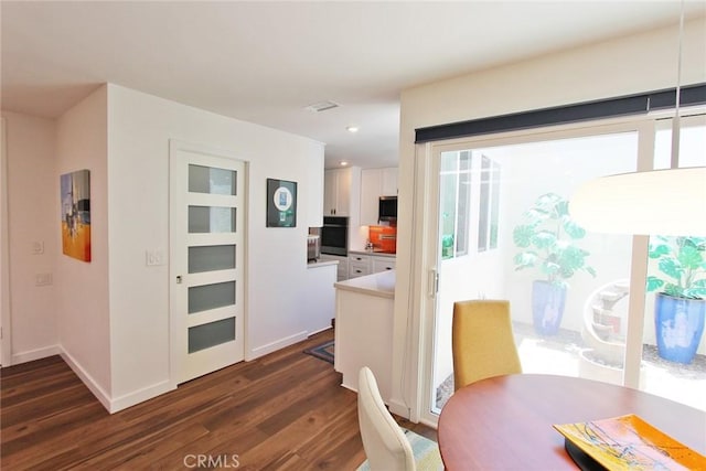 170 Avenida Majorca Unit A, Laguna Woods, CA 92637 - dining room with dark wood-type flooring and recessed lighting