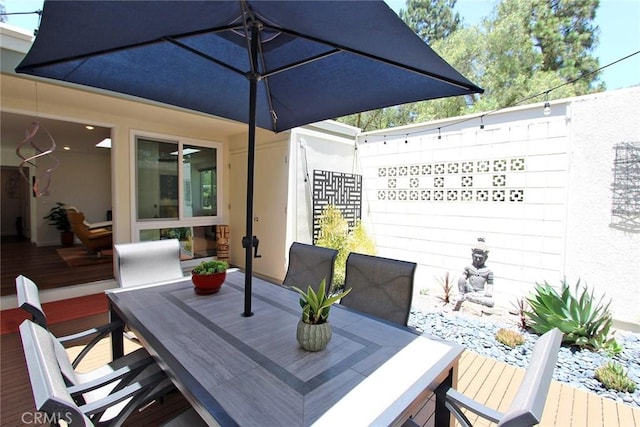 170 Avenida Majorca Unit A, Laguna Woods, CA 92637 - wooden terrace with outdoor dining area