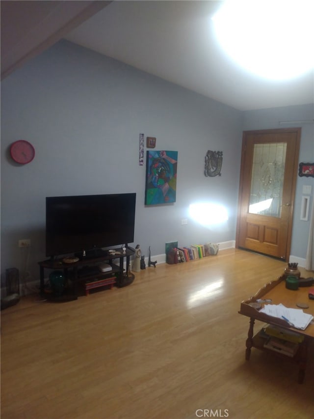 13141 Shawnee Ln Unit M-11 # 267-C, Seal Beach, CA 90740 - living area featuring wood finished floors and vaulted ceiling