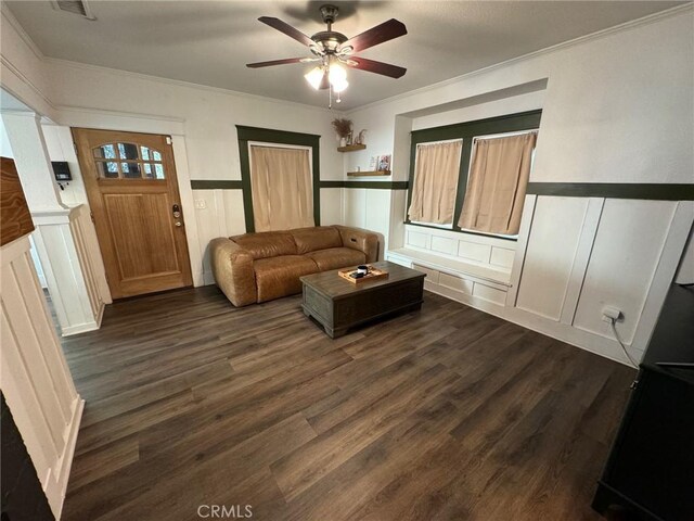 1355 N Gordon St, Pomona, CA 91768 - living area featuring a decorative wall, crown molding, ceiling fan, dark wood-style floors, and a wainscoted wall