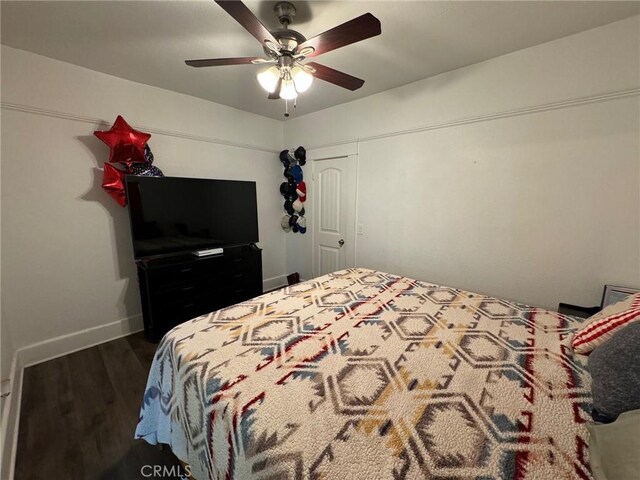 1355 N Gordon St, Pomona, CA 91768 - bedroom with wood finished floors and a ceiling fan