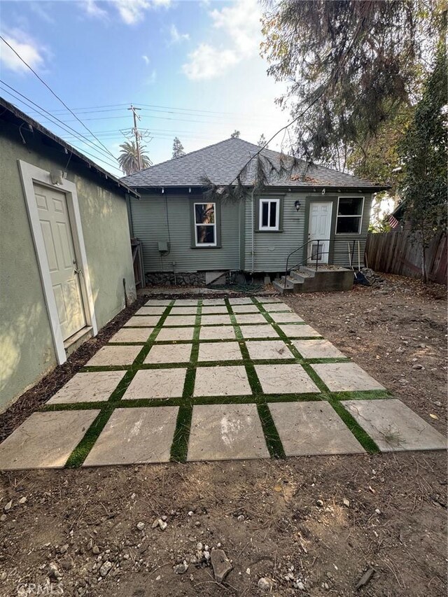 1355 N Gordon St, Pomona, CA 91768 - back of house featuring a shingled roof