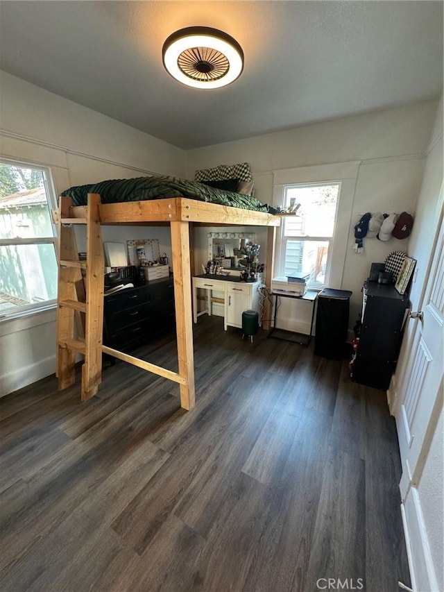 1355 N Gordon St, Pomona, CA 91768 - bedroom featuring dark wood finished floors and an office area