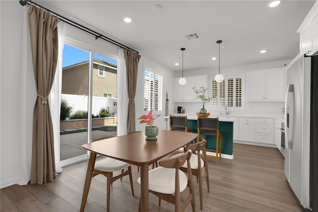 1768 Camellia Ln, Redlands, CA 92374 - dining area featuring recessed lighting and light wood-style flooring