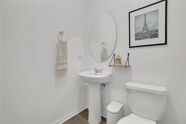 1768 Camellia Ln, Redlands, CA 92374 - half bath with toilet and wood finished floors
