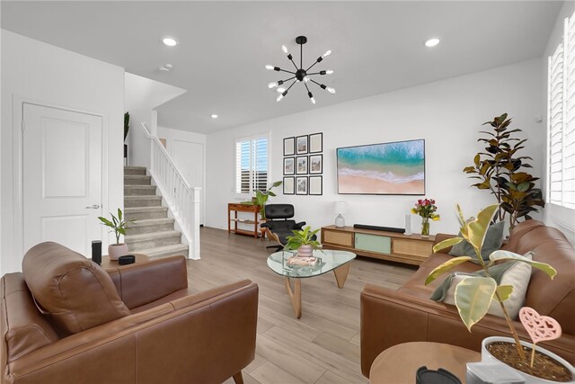 1768 Camellia Ln, Redlands, CA 92374 - living room with stairs, light wood-type flooring, recessed lighting, healthy amount of natural light, and a chandelier