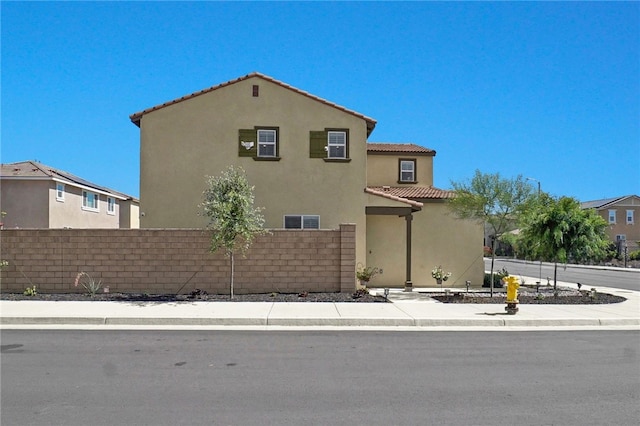 1768 Camellia Ln, Redlands, CA 92374 - mediterranean / spanish house featuring stucco siding and a tile roof