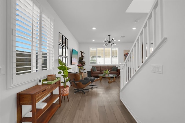 1768 Camellia Ln, Redlands, CA 92374 - foyer featuring a chandelier, wood finished floors, recessed lighting, and stairs