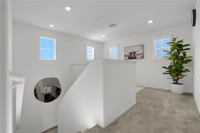 1768 Camellia Ln, Redlands, CA 92374 - hall with an upstairs landing, light colored carpet, and recessed lighting
