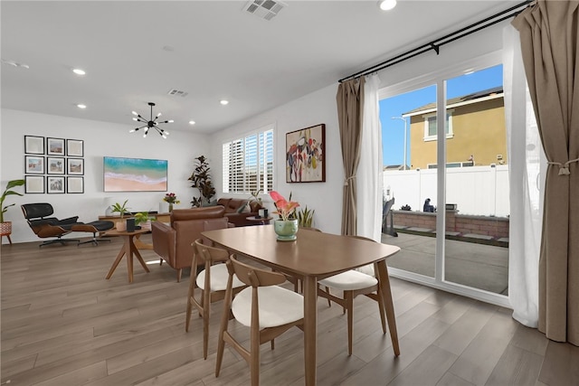 1768 Camellia Ln, Redlands, CA 92374 - dining space featuring recessed lighting, light wood-style floors, and a chandelier