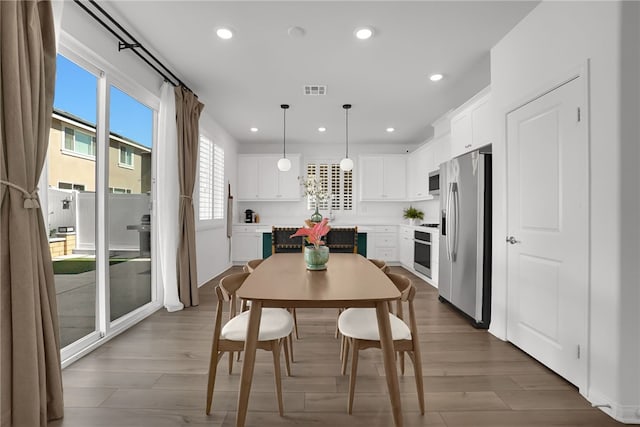 1768 Camellia Ln, Redlands, CA 92374 - dining space with recessed lighting and wood finished floors