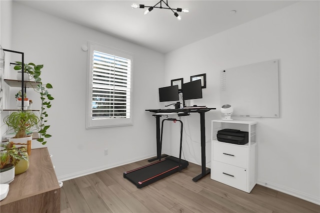 1768 Camellia Ln, Redlands, CA 92374 - exercise area featuring a chandelier and light wood-style floors