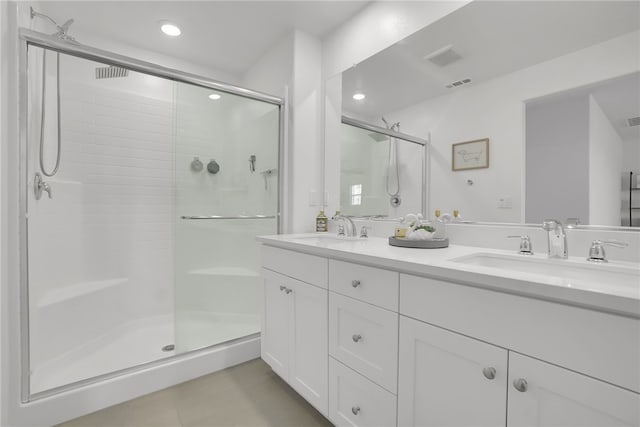1768 Camellia Ln, Redlands, CA 92374 - bathroom with a stall shower, double vanity, recessed lighting, and tile patterned floors