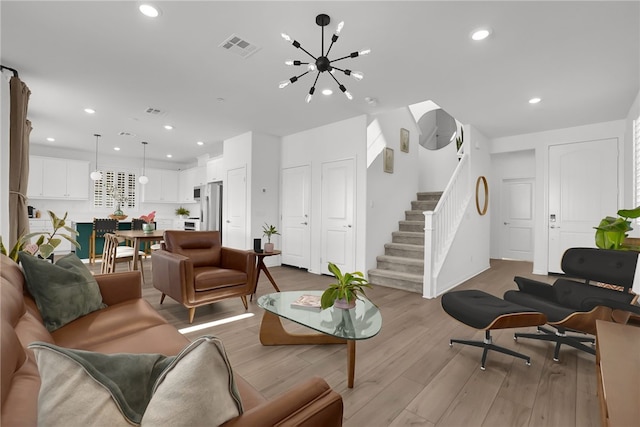 1768 Camellia Ln, Redlands, CA 92374 - living room featuring stairs, light wood finished floors, a chandelier, and recessed lighting