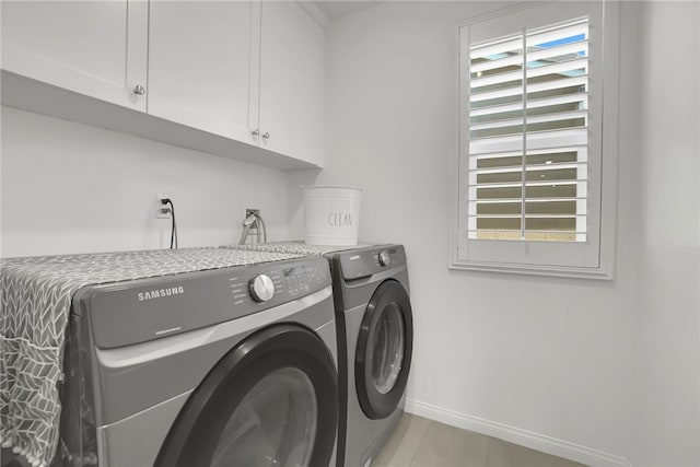 1768 Camellia Ln, Redlands, CA 92374 - laundry room featuring washing machine and clothes dryer, cabinet space, and light tile patterned flooring