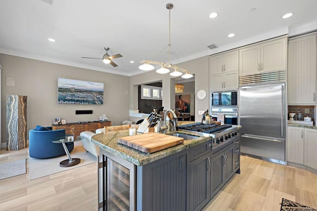 834 S Cedros, Solana Beach, CA 92075 - kitchen featuring built in appliances, beverage cooler, ceiling fan, gray cabinets, and recessed lighting