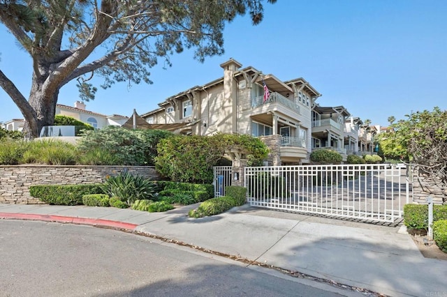 834 S Cedros, Solana Beach, CA 92075 - view of front of home featuring a gate and a balcony