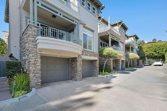 834 S Cedros, Solana Beach, CA 92075 - view of building exterior with a garage and driveway
