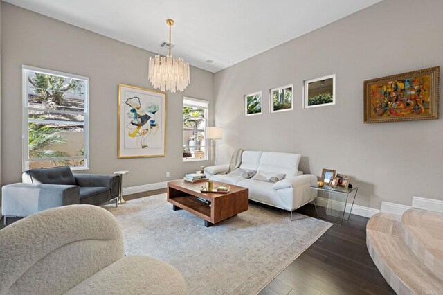 834 S Cedros, Solana Beach, CA 92075 - living room featuring a chandelier and wood finished floors