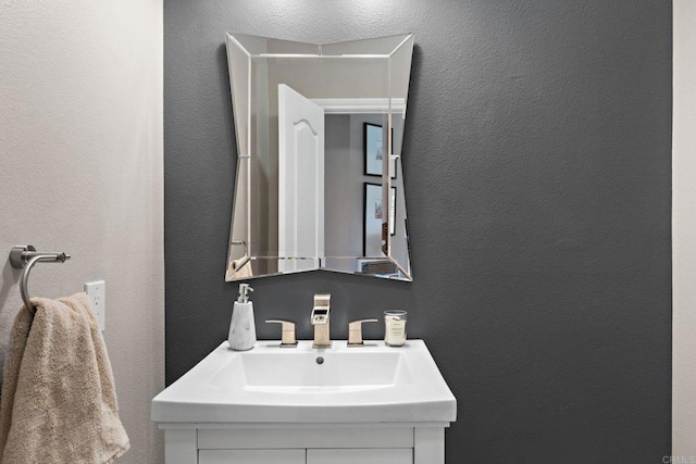 834 S Cedros, Solana Beach, CA 92075 - bathroom featuring a textured wall and vanity