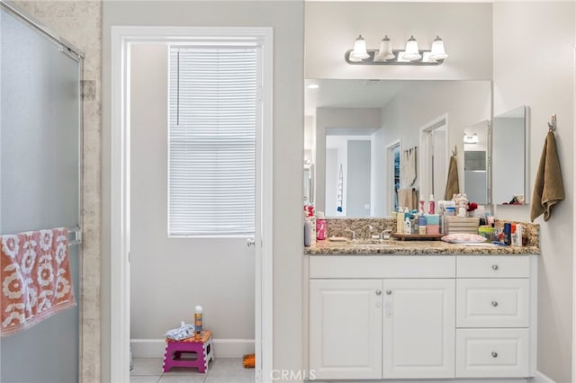15530 Bonsai Way, Tustin, CA 92782 - bathroom with vanity, a shower stall, and tile patterned floors