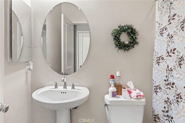 15530 Bonsai Way, Tustin, CA 92782 - bathroom featuring toilet and a shower with curtain