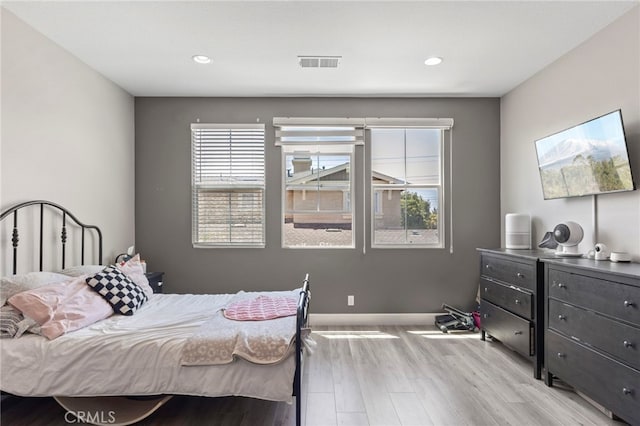 15530 Bonsai Way, Tustin, CA 92782 - bedroom with wood finished floors, multiple windows, and recessed lighting