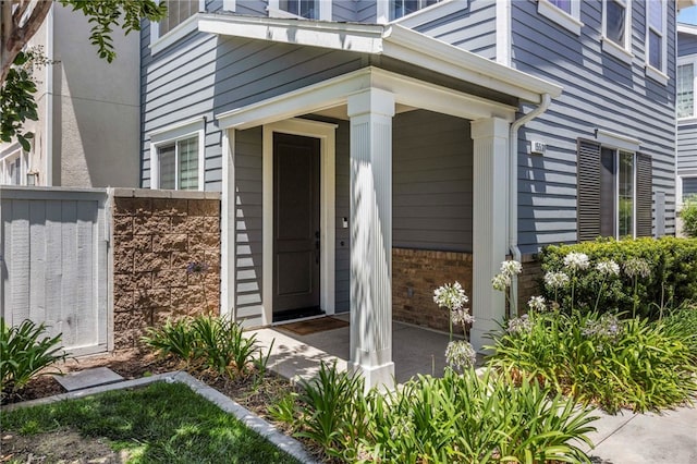 15530 Bonsai Way, Tustin, CA 92782 - entrance to property featuring a porch and brick siding