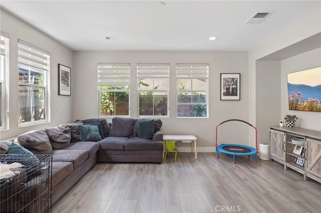 15530 Bonsai Way, Tustin, CA 92782 - living room with light wood-type flooring and recessed lighting