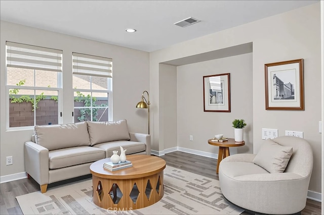 15530 Bonsai Way, Tustin, CA 92782 - living room featuring wood finished floors and recessed lighting