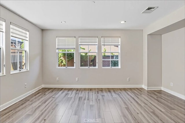15530 Bonsai Way, Tustin, CA 92782 - unfurnished room featuring light wood-style floors and recessed lighting