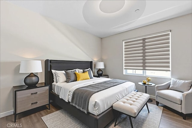 15530 Bonsai Way, Tustin, CA 92782 - bedroom with dark wood-style flooring and baseboards