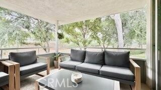 22215 Caminito Vino, Laguna Hills, CA 92653 - sunroom / solarium with an outdoor living space and healthy amount of natural light