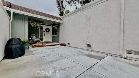 22215 Caminito Vino, Laguna Hills, CA 92653 - property entrance featuring a patio