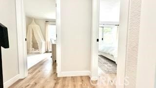 22215 Caminito Vino, Laguna Hills, CA 92653 - hallway with baseboards and wood finished floors