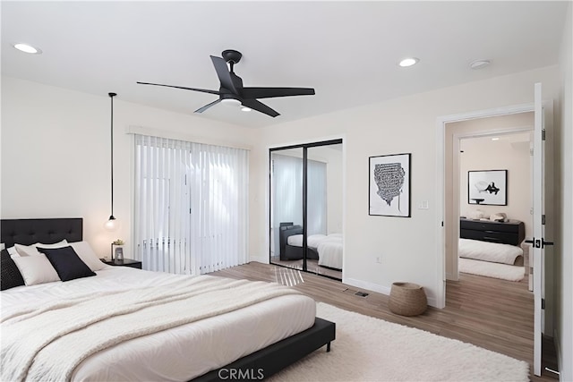 21312133 S Cloverdale Ave, Los Angeles, CA 90016 - bedroom with wood finished floors, a closet, recessed lighting, and ceiling fan