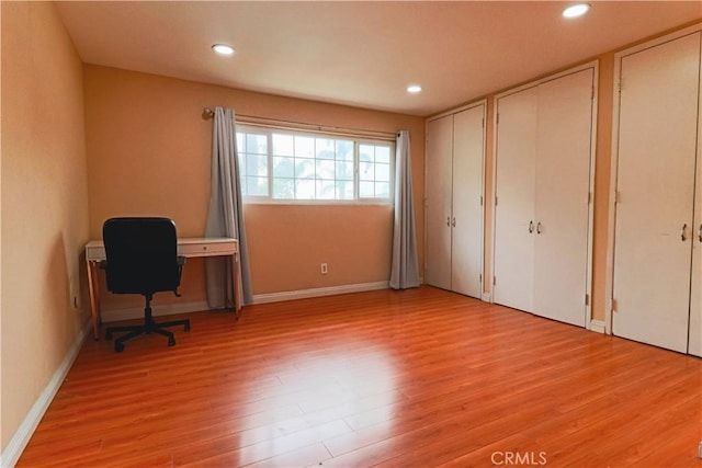 1602 N King St Unit E1, Santa Ana, CA 92706 - unfurnished office with light wood-style floors and recessed lighting