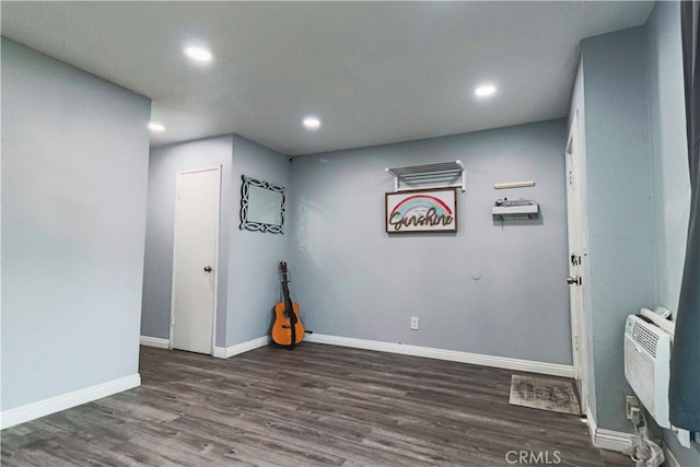 1602 N King St Unit E1, Santa Ana, CA 92706 - empty room with recessed lighting, wood finished floors, and a wall mounted AC