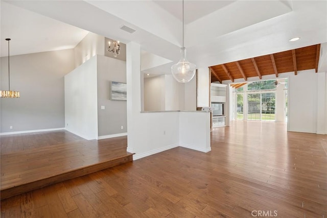 22501 Marilla St, Chatsworth, CA 91311 - unfurnished living room with a chandelier and hardwood / wood-style flooring