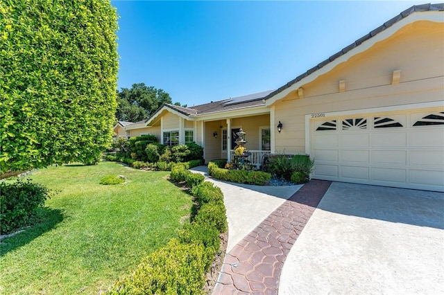 22501 Marilla St, Chatsworth, CA 91311 - single story home with driveway, a front yard, solar panels, and a garage