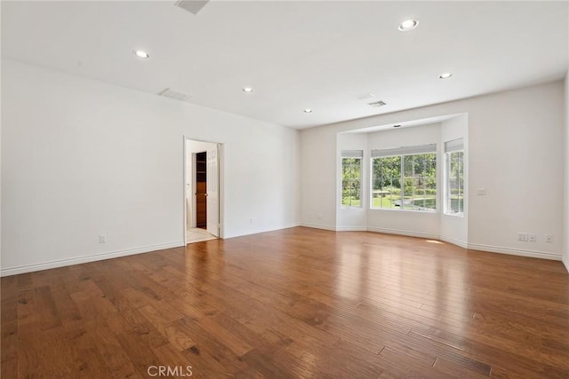 22501 Marilla St, Chatsworth, CA 91311 - unfurnished room with wood finished floors and recessed lighting