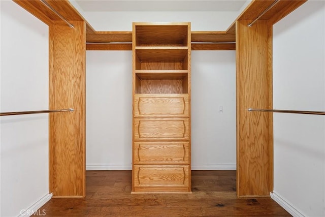 22501 Marilla St, Chatsworth, CA 91311 - spacious closet featuring wood finished floors