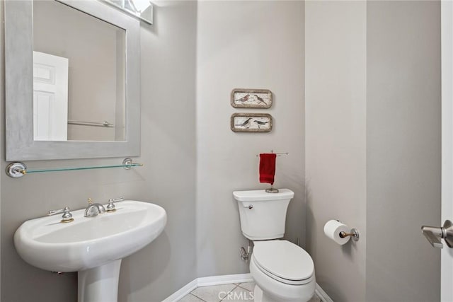 22501 Marilla St, Chatsworth, CA 91311 - bathroom featuring toilet and tile patterned flooring
