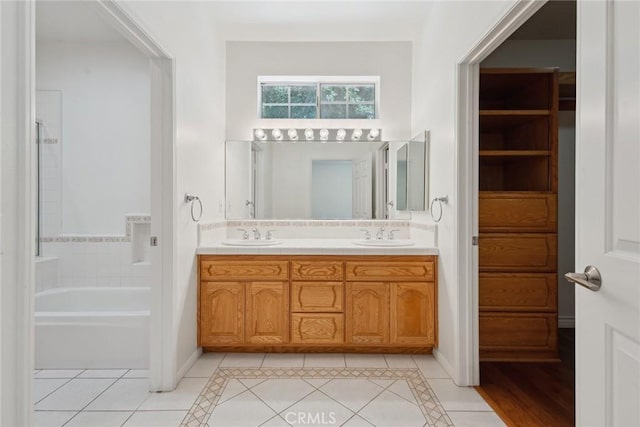 22501 Marilla St, Chatsworth, CA 91311 - full bathroom featuring tile patterned floors, double vanity, and a bathtub