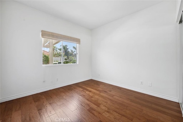 22501 Marilla St, Chatsworth, CA 91311 - unfurnished room featuring wood finished floors and baseboards
